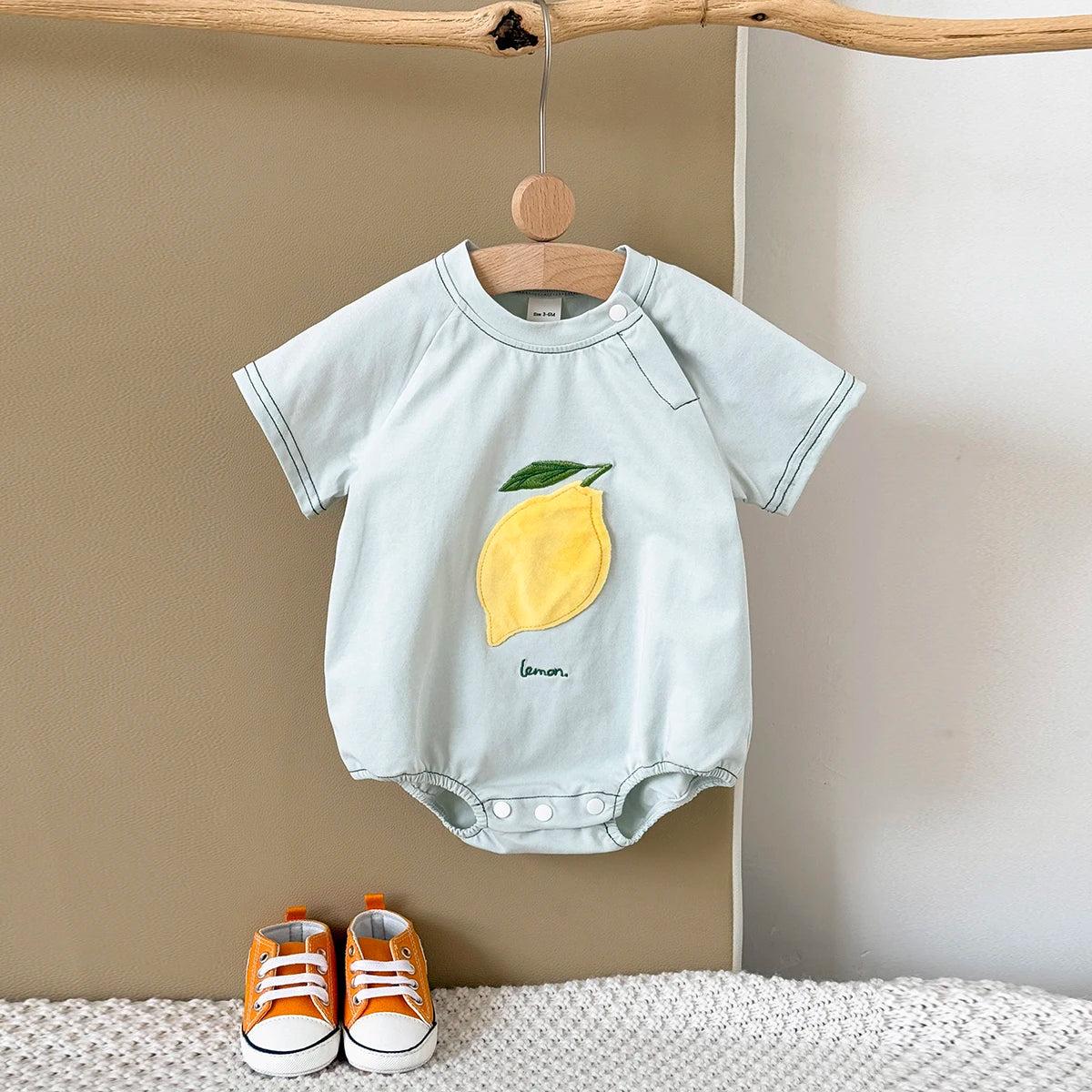 LittleMaylah™ Newborn Baby Bodysuit – Cotton Triangle Romper with Plush Letter Design (0–18M)