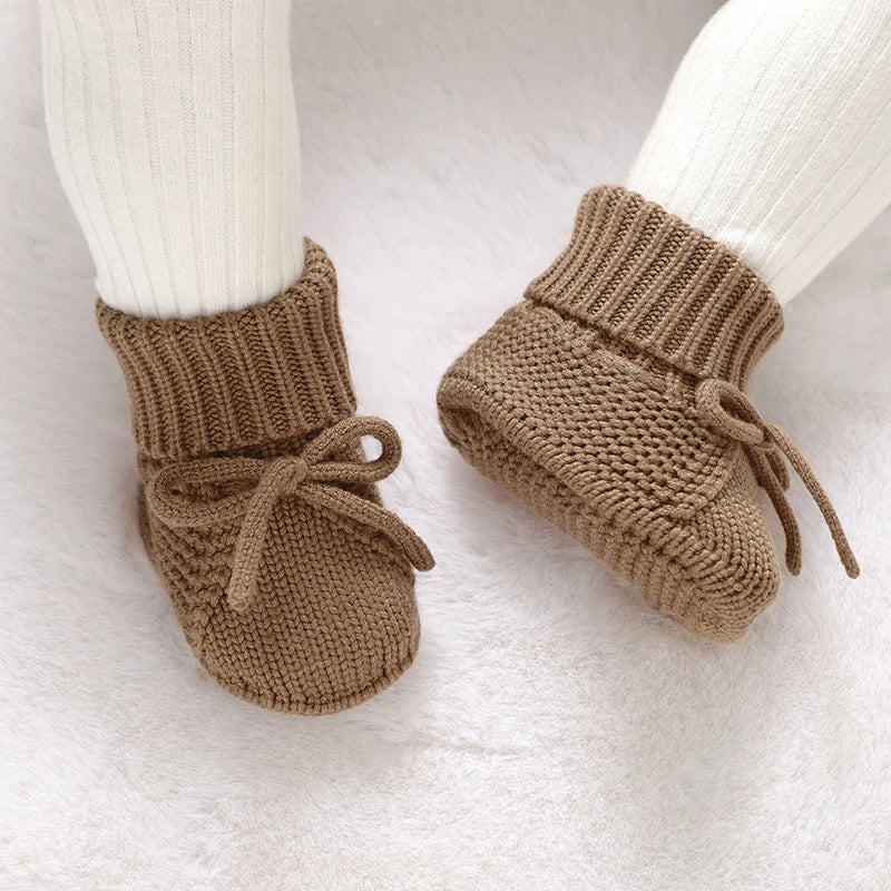 LittleMaylah™ Knitted Baby Booties (0–18M) Soft, cozy, and adorable knitted baby shoes for newborn boys and girls. Perfect for keeping tiny feet warm and stylish. Ideal for everyday wear or as a baby shower gift.