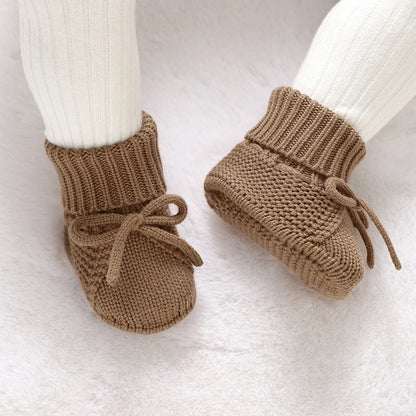 LittleMaylah™ Knitted Baby Booties (0–18M) Soft, cozy, and adorable knitted baby shoes for newborn boys and girls. Perfect for keeping tiny feet warm and stylish. Ideal for everyday wear or as a baby shower gift.