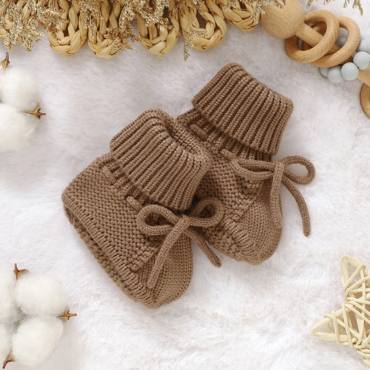 LittleMaylah™ Knitted Baby Booties (0–18M) Soft, cozy, and adorable knitted baby shoes for newborn boys and girls. Perfect for keeping tiny feet warm and stylish. Ideal for everyday wear or as a baby shower gift.